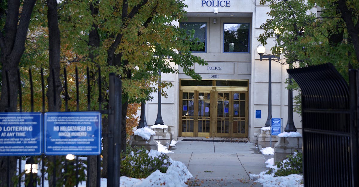 Federal law enforcement vehicles outside an office building, illustrating the FBI search warrant executed in Portsmouth, Virginia, on Wednesday