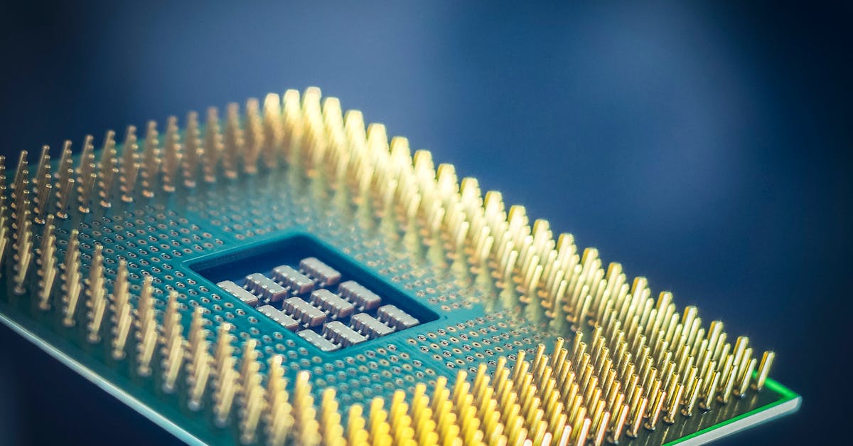 Macro view of a microprocessor showing gold pins, illustrating Samsung's record memory chip earnings driving its trillion-dollar valuation