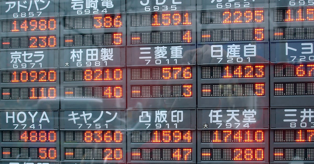 Tokyo stock-market display board showing rising prices, illustrating the Nikkei's record close above 62,000 on Thursday