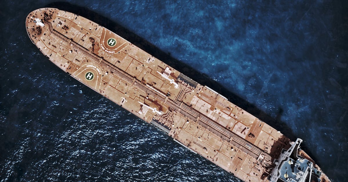 Drone shot of large oil tanker ship in open ocean waters