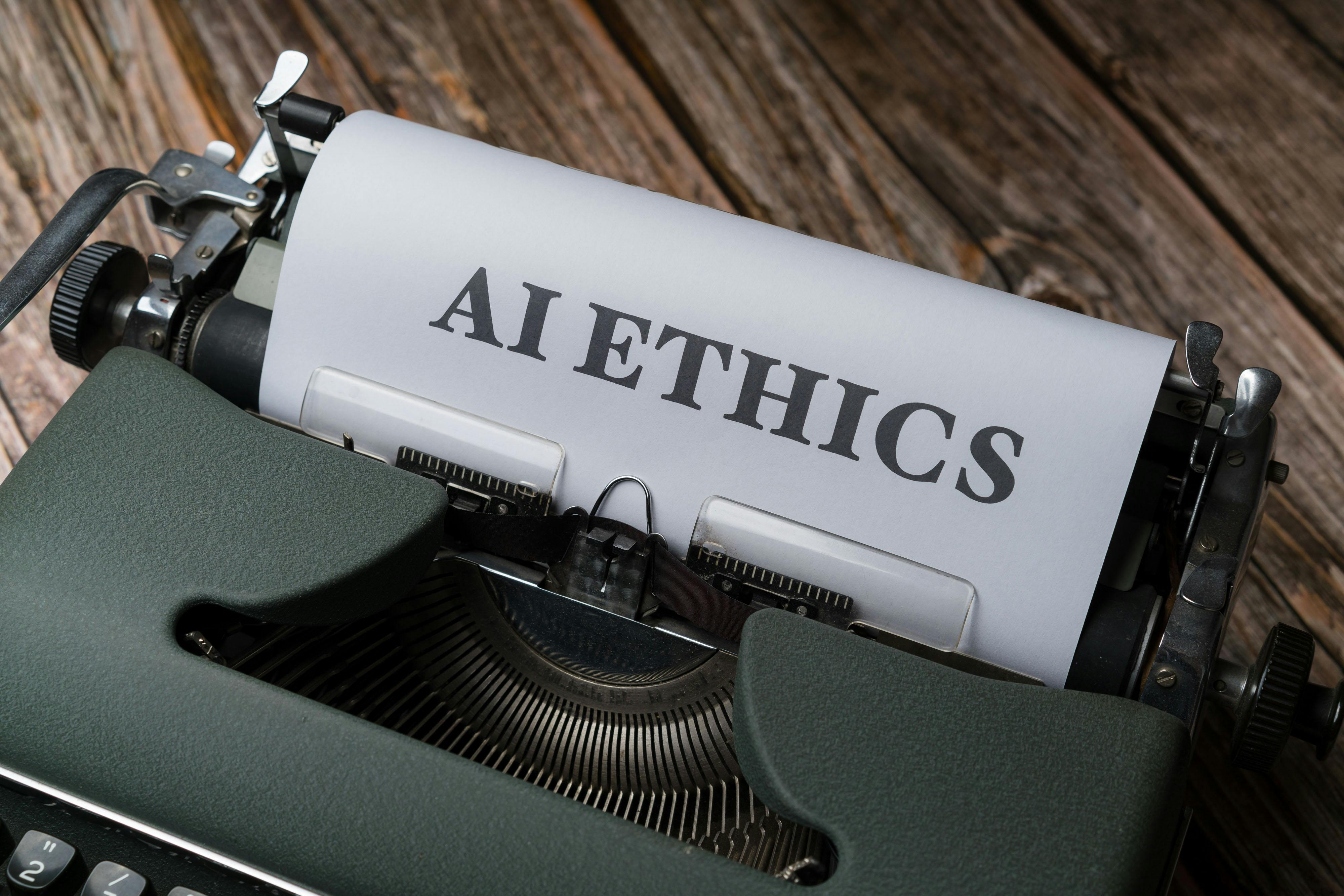 Retro typewriter with AI Ethics typed on paper, symbolizing technology policy and regulation